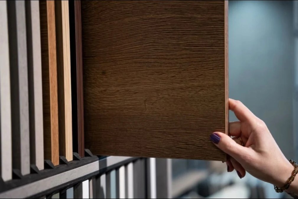 Textured oak door samples on the showroom display rack