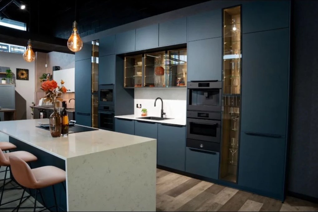 Blue German kitchen with a large stone island at the Kutchenhaus Irthlingborough showroom